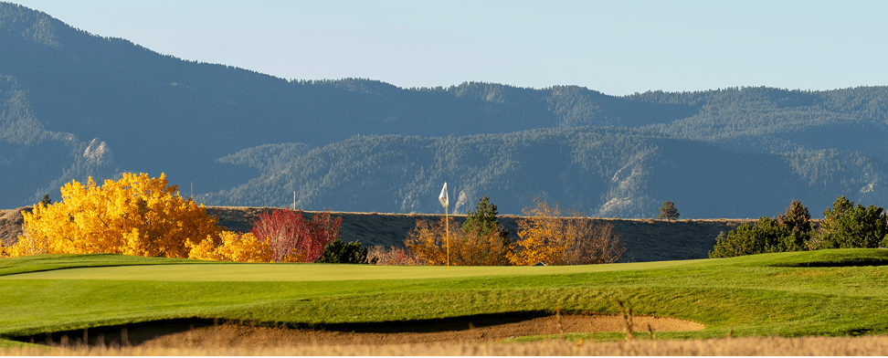 Lake Valley Golf Club green with the Colorado foothills behind