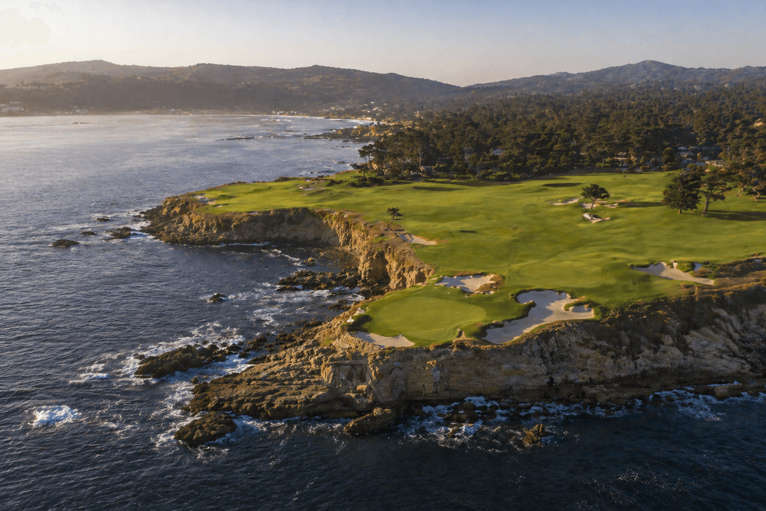 Coastal view of Pebble Beach golf links over the Pacific